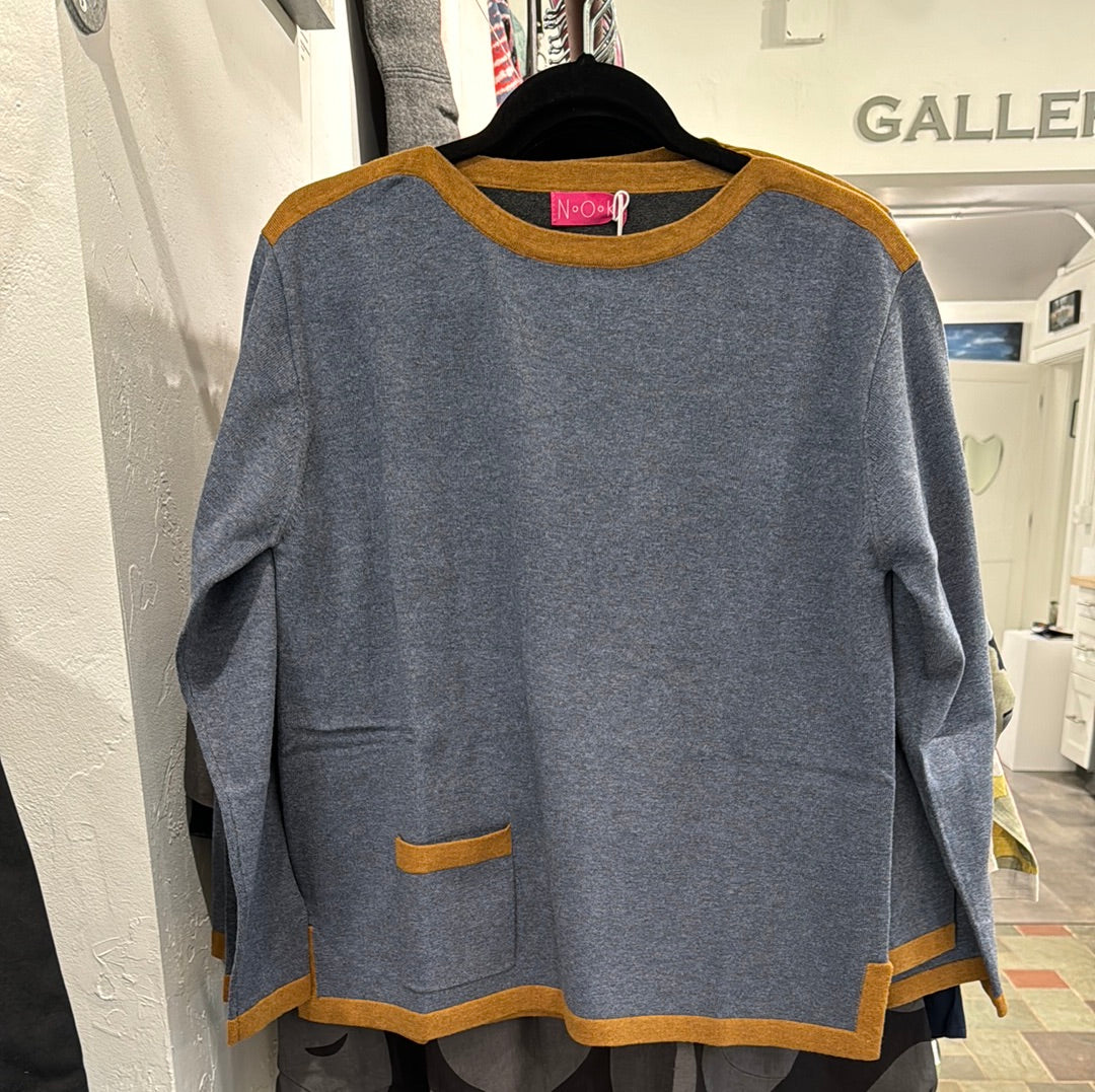 N.O.K. Sweater trimmed