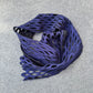 Blue lace scarf on a gray background