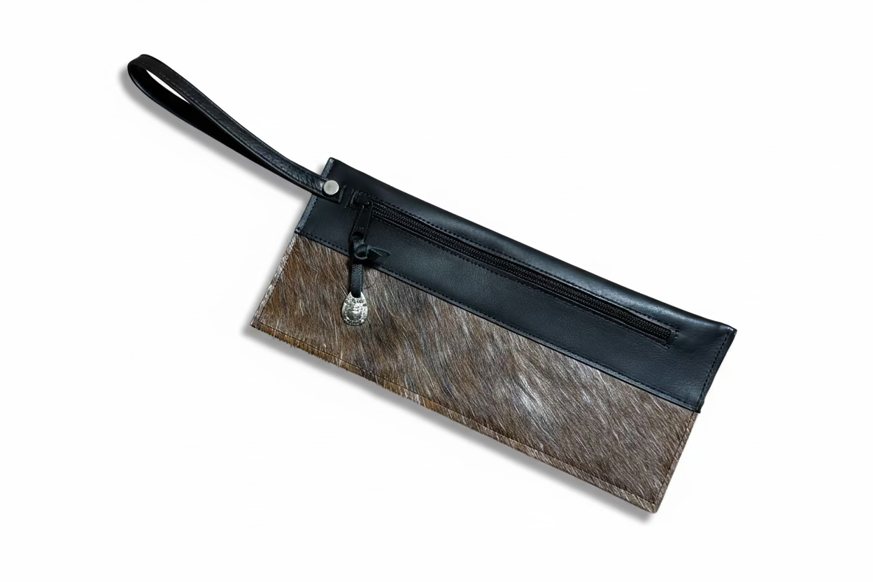 Handmade Leather clutch with a zipper and a cowhide 